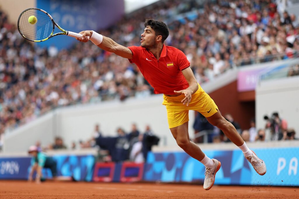 carlos-alcaraz-stretches-for-the-ball-during-mens-singles-first-round-match-at-olympic-summer-games-paris-2024