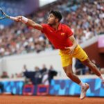 carlos-alcaraz-stretches-for-the-ball-during-mens-singles-first-round-match-at-olympic-summer-games-paris-2024